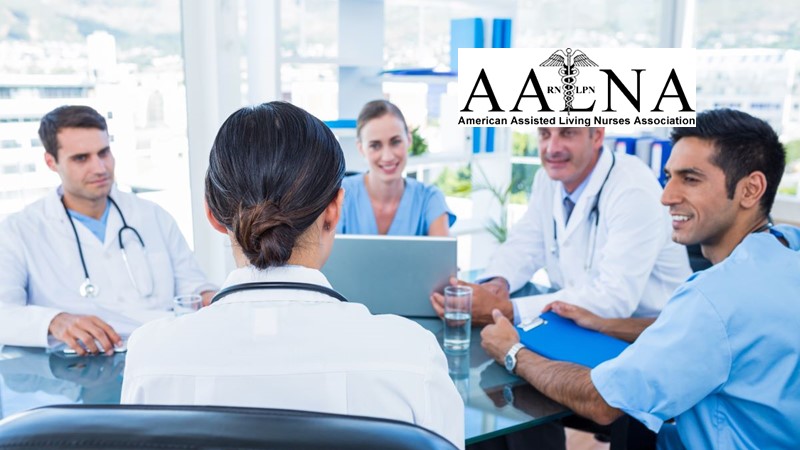 health care professionals sitting around table