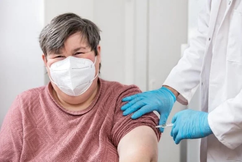 male with I/DD getting a vaccination