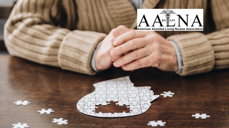 senior man assembling a jigsaw puzzle