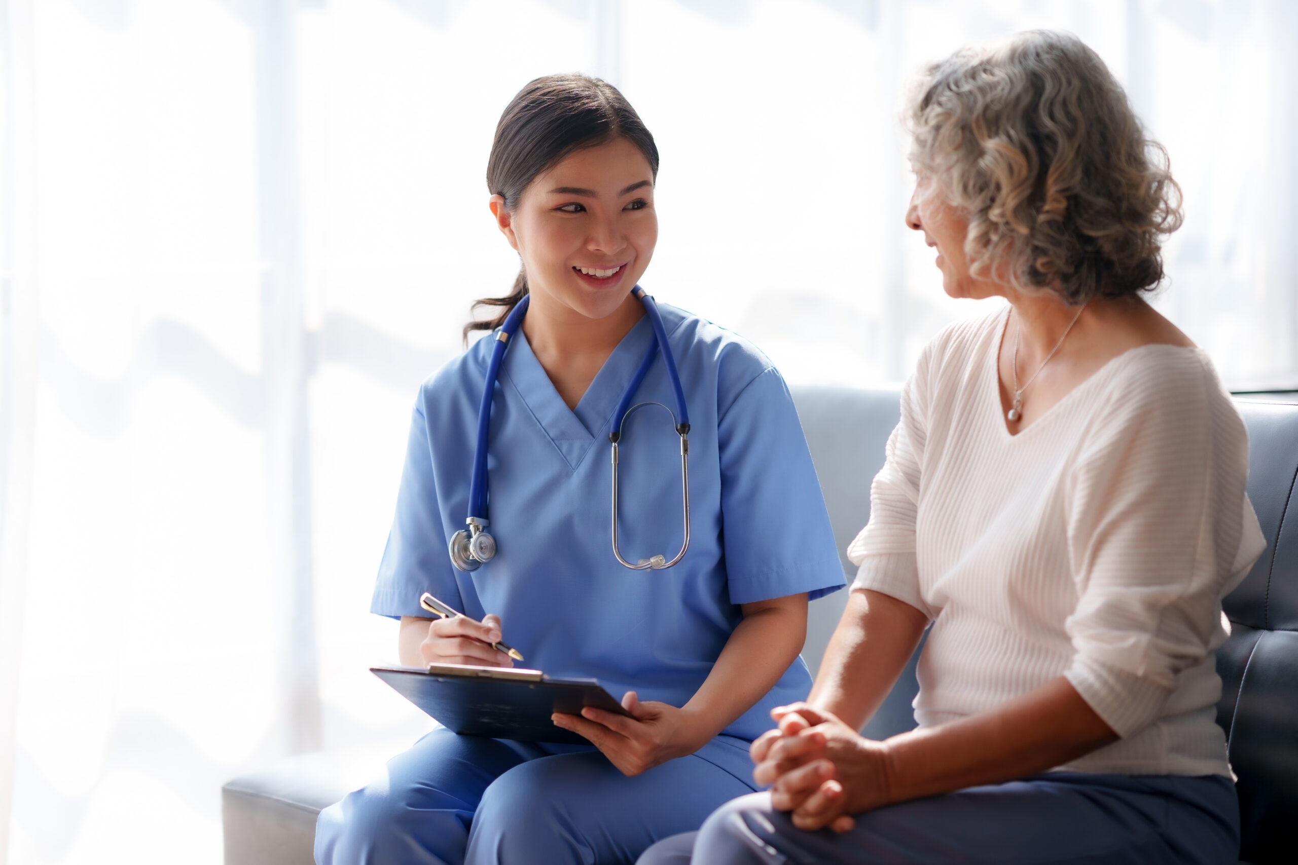 Health care professional with female resident